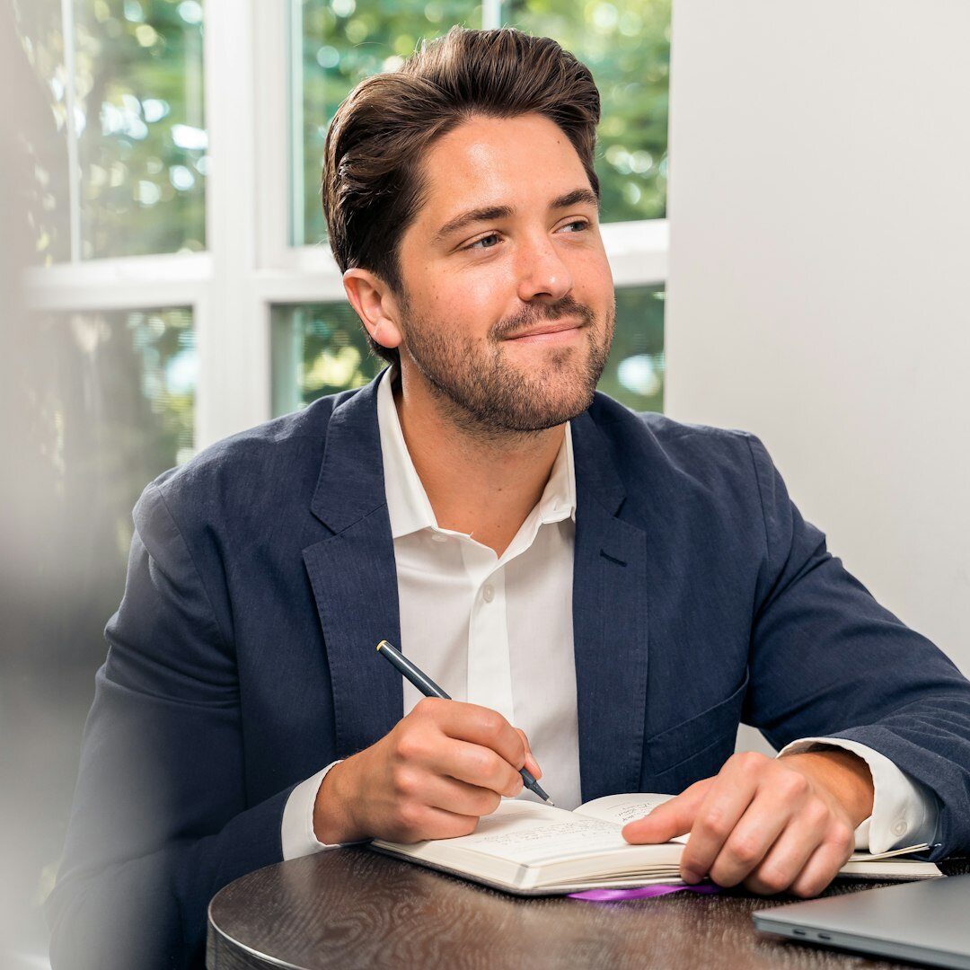 Journalist reviewing notes before a live segment